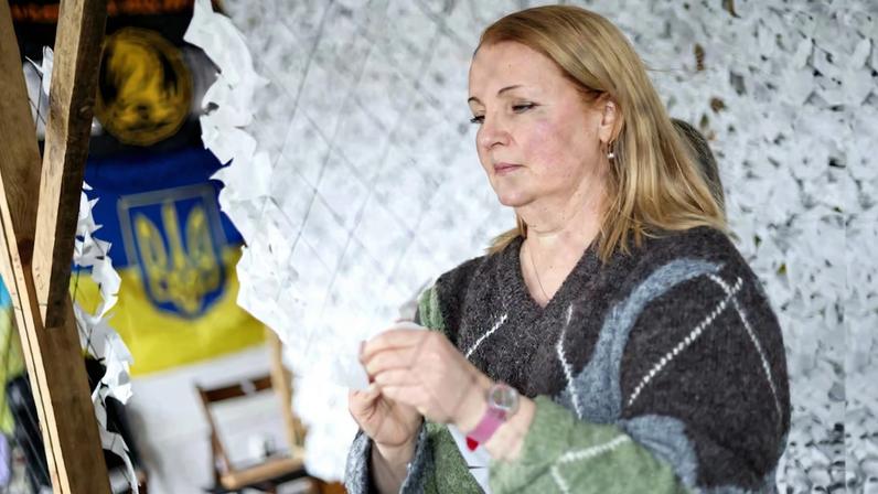 Ukrainian family sit on packed bags in Poland, unsure they will ever return to Kyiv