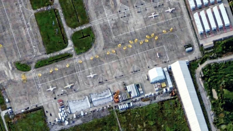A satellite image shows large drones at Qionghai Boao International Airport on Hainan Island