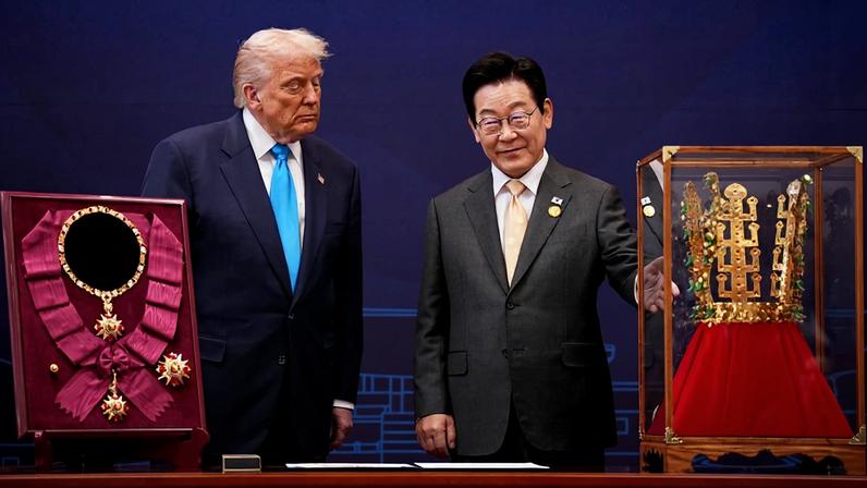 U.S. President Donald Trump reacts as he is presented with the Grand Order of Mugunghwa and the Silla gold crown by South Korean President Lee Jae-myung at the Gyeongju National Museum in Gyeongju, South Korea.