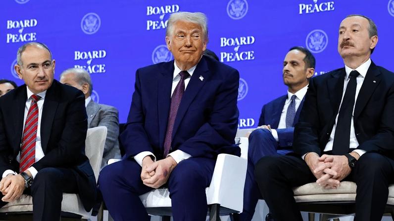 Armenian Prime Minister Nikol Pashinyan, U.S. President Donald Trump, and Azerbaijani President Ilham Aliyev attend a ceremony.