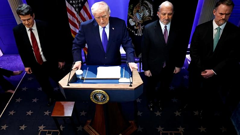 From left to right: U.S. Solicitor General D. John Sauer, U.S. President Donald Trump, U.S. Commerce Secretary Howard Lutnick, and U.S. Trade Representative Jamieson Greer attend a press briefing at the White House in Washington on Feb. 20.