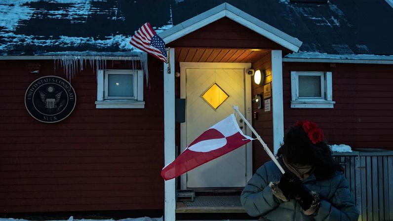 People protest in front of the U.S. consulate in Nuuk