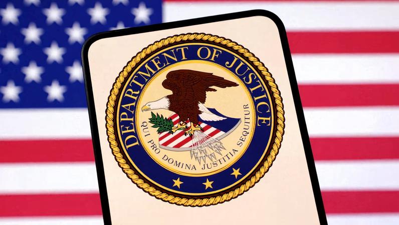 United States Department of Justice logo and U.S. flag are seen in this illustration taken April 23, 2025. REUTERS/Dado Ruvic/Illustration/File Photo
