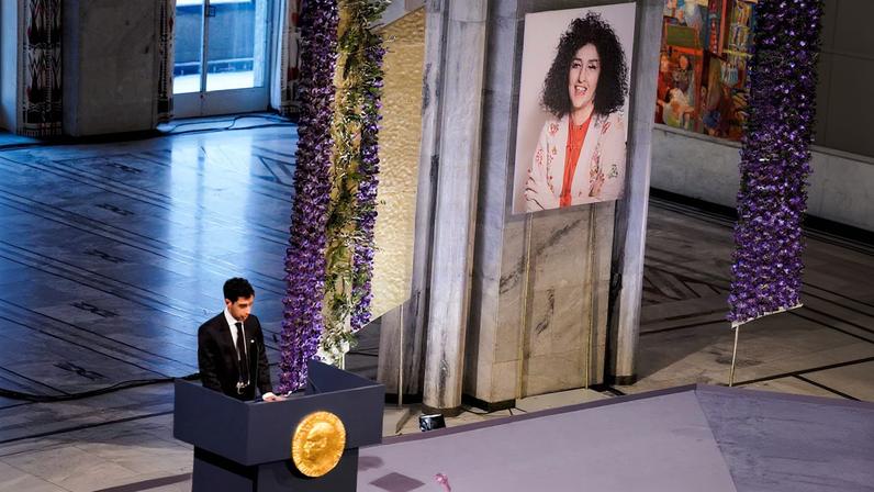 Ali Rahmani, son of Narges Mohammadi, an imprisoned Iranian human rights activist, who was awarded the Nobel Peace Prize 2023, speaks after receiving the award on behalf of his mother at Oslo...