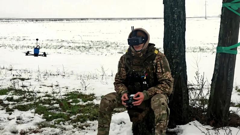 A Ukrainian soldier flies a drone in Ukraine on Jan. 7. Viacheslav Madiievskyi/Ukrinform/NurPhoto via Getty Images