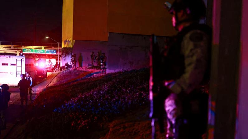 Members of the Mexican army and the National Guard stand guard at a roundabout on a main avenue, following a military operation in which Mexican officials said cartel boss Nemesio Oseguera, "El Mencho," was killed in Jalisco state, in Guadalajara, Mexico, February 23, 2026. REUTERS/Jose Luis Gonzalez