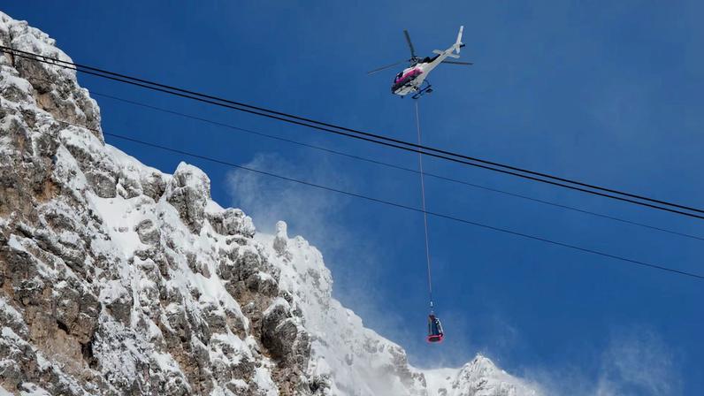 Feb 6, 2026; Cortina d'Ampezzo, ITALY; Avalanche control is seen before women's downhill training during the Milano Cortina 2026 Olympic Winter Games at Tofane Alpine Skiing Centre. Mandatory Credit: Eric Bolte-Imagn Images