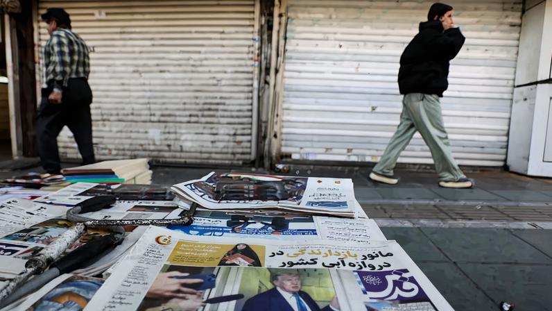 An Iranian newspaper with a cover photo of U.S. President Donald Trump, in Tehran, Iran, February 19, 2026. Majid Asgaripour/WANA (West Asia News Agency) via REUTERS