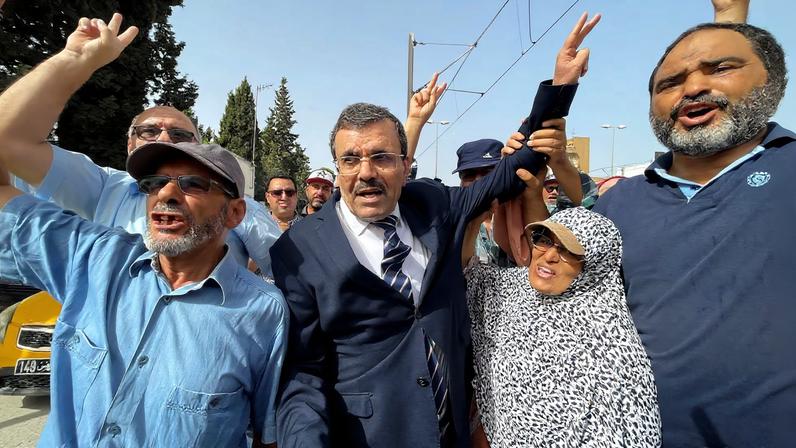 Ali Larayedh, senior official of Tunisia's Islamist opposition party Ennahda, arrives for questioning in Tunis
