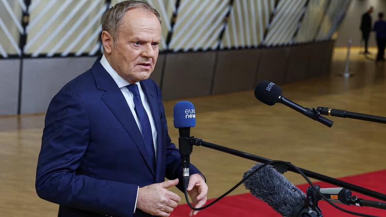 Polish Prime Minister Donald Tusk speaks to the media in Brussels, Belgium January 22, 2026. REUTERS/Yves Herman