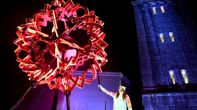 Milano Cortina 2026 Olympics - Opening Ceremony - Cortina d'Ampezzo, Cortina d'Ampezzo, Italy - February 6, 2026 General view as Sofia Goggia of Italy holds the Olympic torch after lighting the Olympic cauldron during the opening ceremony Pool via REUTERS/Stefano Rellandini/File Photo