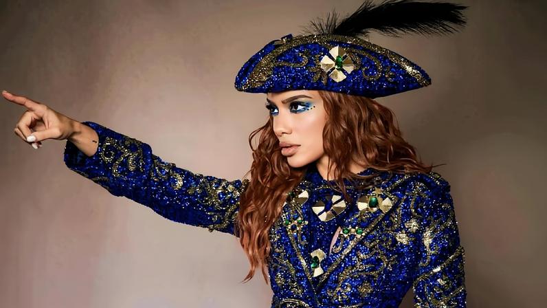 Anitta veste figurino inspirado no signo de Libra — Foto: Fred Othero/Divulgação