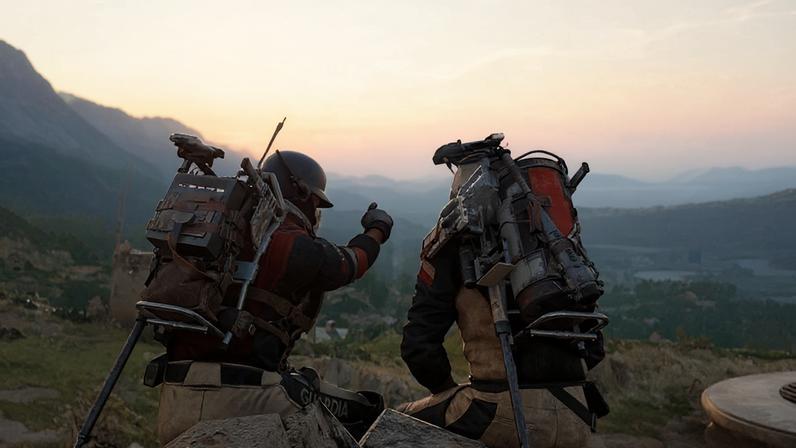 Two players share glitch techniques at sunset.