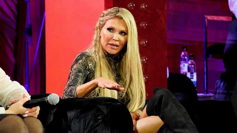Brandi Glanville (pictured here at BravoCon in New York City in October 2022) revealed she spent $200,000 to find out that it was her breast implants causing her facial disfiguration and sickness for three years.