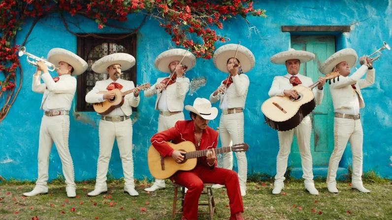 Bruno Mars performs with a mariachi band in his music video for "Risk It All."