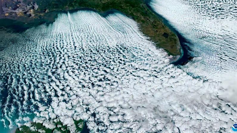 NOAA’s GOES East satellite captured long, parallel bands of clouds called horizontal convective rolls on Feb 1, 2026.