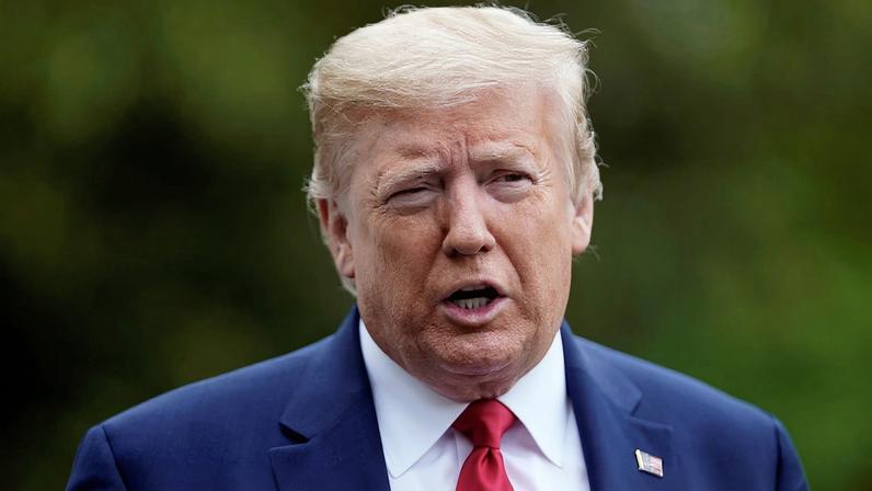 U.S. President Donald Trump speaks to reporters after arriving from Camp David to the White House in Washington, U.S. May 17, 2020. REUTERS/Eric Thayer