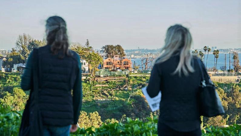 Visitors at the site in the Palisades for the planned memorial