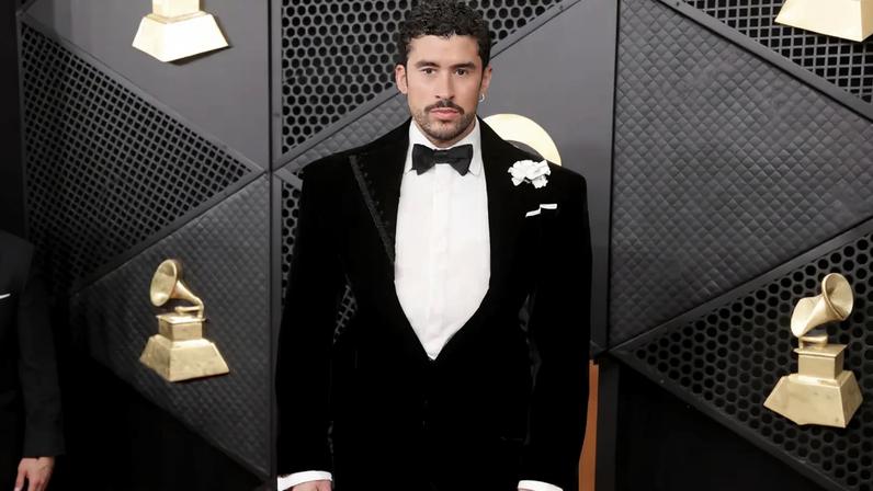 Bad Bunny’s velvet Schiaparelli tuxedo on the Grammys 2026 red carpet had a cheeky twist from behind.