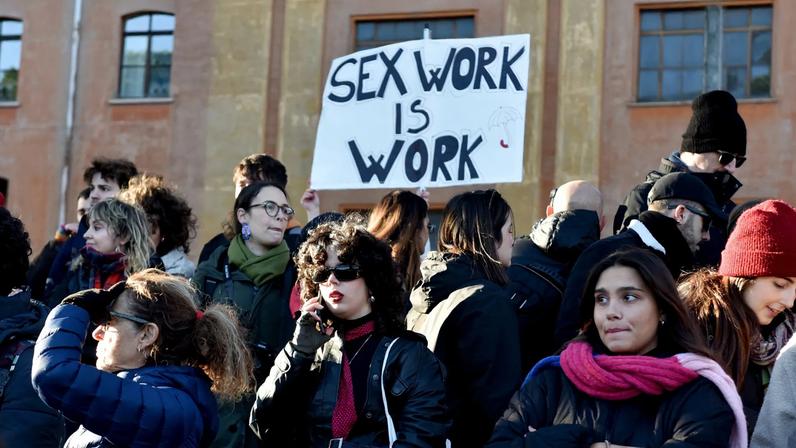 People participating in the National demonstration against patriarchal violence against women in Rome, Italy.