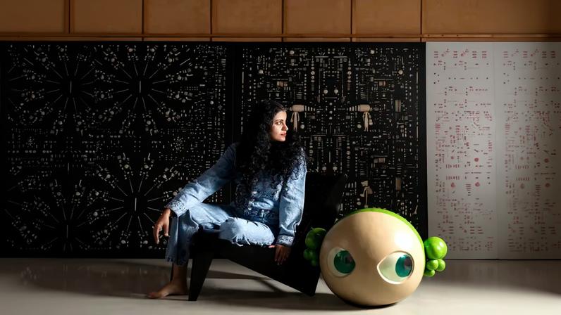 Princess Pea (also known as Natasha Preenja will exhibit a 6ft-tall embroidered wooden sculpture depicting a squatting woman at India Art Fair