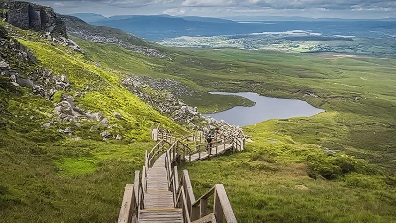 The Cuilcagh Boardwalk Trail in County Fermanagh crosses through one of the largest expanses of blanket bog in Northern Ireland