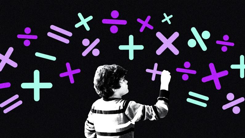 A child writing math symbols.