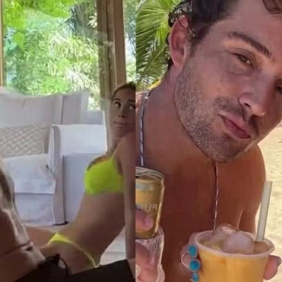 Luisa Perissé treina na praia com o namorado