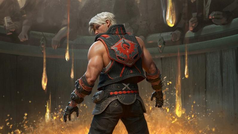 A man in an arena is surrounded by fire.