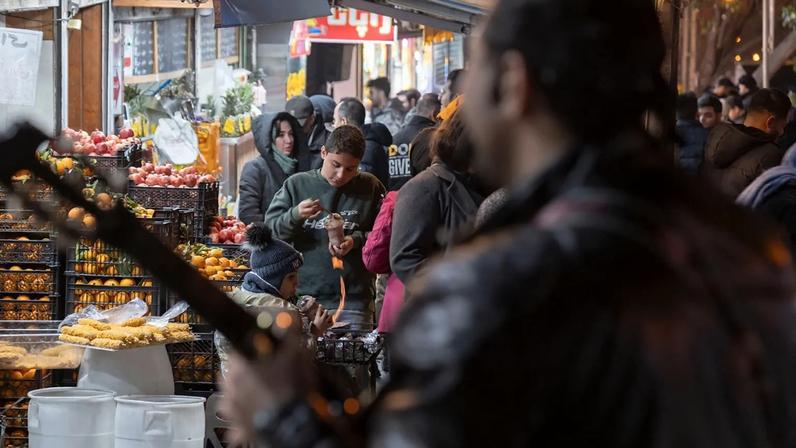 A musician plays in the streets of Tehran, February 2026.