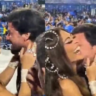 Juliana Paes troca carinhos e recebe beijo no pescoço no Desfile das Campeãs