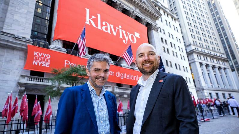 Ed Hallen MBA ’12 (right) and Andrew Bialecki stand outside the New York Stock Exchange in September 2023 on the day their company, Klaviyo, completed its IPO. Hallen and Bialecki are donating $6 million to fund the MIT delta v accelerator.
