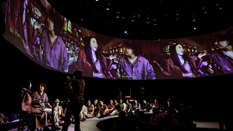 The play "A Dream Like a Dream 如夢之夢" featured a paper projection screen, 30 actors, and onstage camera work during the performance.