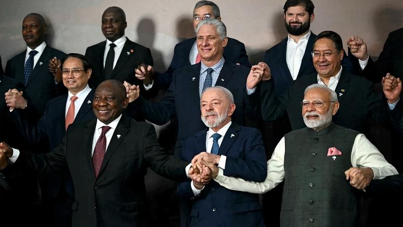 Vietnam's Prime Minister Pham Minh Chinh, Cuba's President and First Secretary Miguel Diaz-Canel, Bolivia's President Luis Arce Catacora, South Africa's President Cyril Ramaphosa, Brazil's President Luiz Inacio Lula da Silva, and India's Prime Minister Narendra Modi pose for a family photo during the BRICS summit in Rio de Janeiro, Brazil, on July 7, 2025.