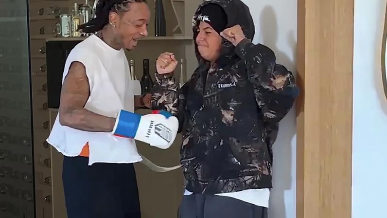Wiz Khalifa punched his son, Sebastian, in the stomach 13 times during a birthday tradition.