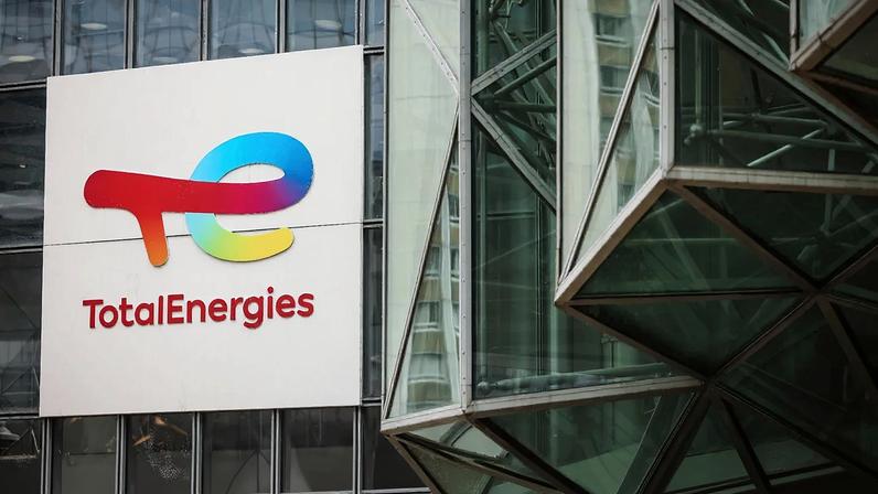 FILE - A sign for the French company TotalEnergies is displayed at headquarters March 21, 2025, in La Defense business district outside of Paris.