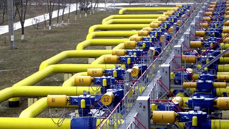 FILE - A set of pipes in a gas storage and transit point in Boyarka, just outside Kiev, Ukraine, Jan. 3, 2006. (AP Photo/Sergei Chuzavkov, File)