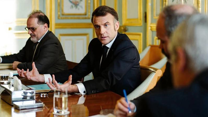 Emmanuel Macron speak to journalists at the Elysée Palace in Paris