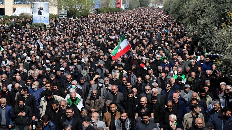 People attend Friday prayer in Tehran