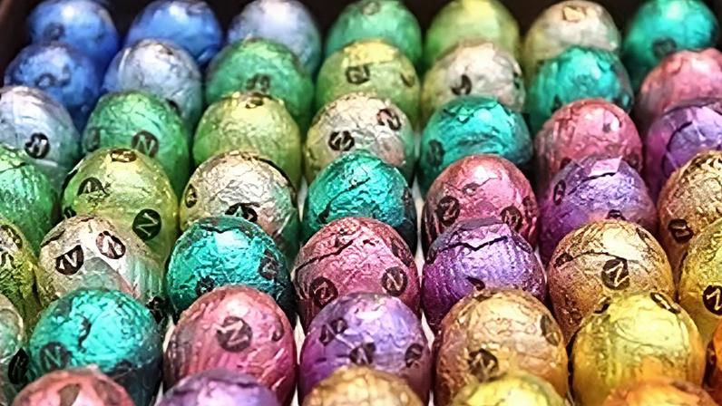 A selection of different flavoured chocolate eggs are displayed for Easter at a chocolate shop downtown Brussels on Friday, April 6, 2012.