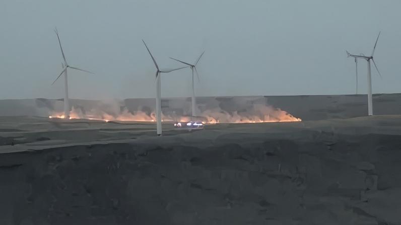 Carl Greenhalgh Fire near wind turbines on Scout Moor