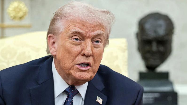 U.S. President Donald Trump speaks as he meets with German Chancellor Friedrich Merz in the Oval Office at the White House in Washington, D.C., U.S., March 3, 2026. REUTERS/Jonathan Ernst
