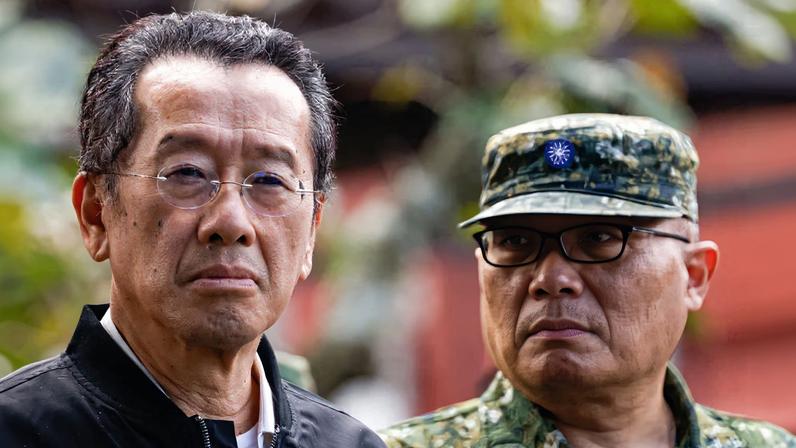 Taiwan Defence Minister Wellington Koo inspects reservists during a training session at Loung Te Industrial Parks Service Center in Yilan