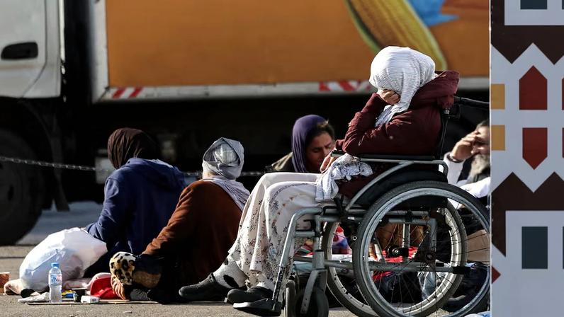 Displaced people from the southern suburbs, gather at Martyrs' Square in Beirut
