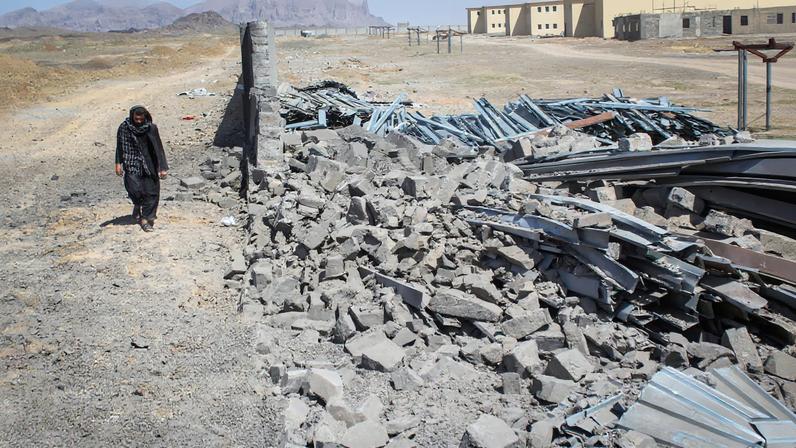 An Afghan man walks past a damaged wall following airstrikes, amid the conflict between Afghanistan and Pakistan, in Kandahar, Afghanistan, February 28, 2026. REUTERS/Stringer