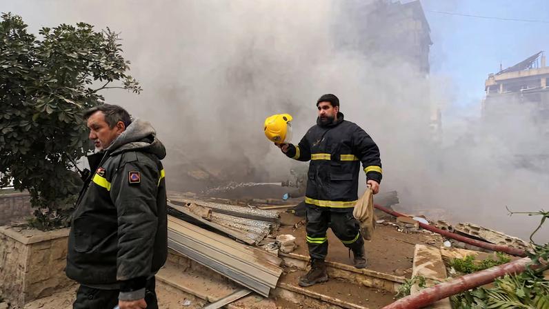 Emergency personnel work at the site of an Israeli strike on Beirut's southern suburbs, following an escalation between Hezbollah and Israel amid the U.S.-Israeli conflict with Iran, Lebanon, March 3, 2026.