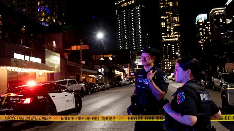 Austin police officers work at the scene after a deadly mass shooting outside Buford's, a popular roadhouse-style bar in Austin, Texas, U.S. March 1, 2026. REUTERS/Nuri Vallbona