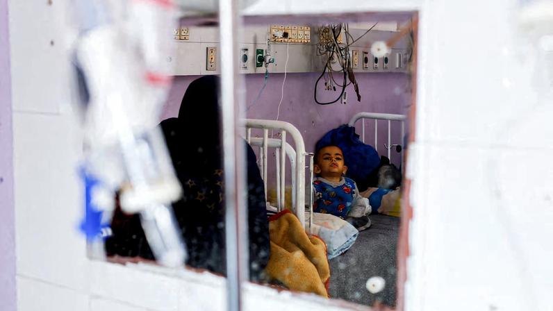 Palestinian children receive treatment at Al-Aqsa Martyrs Hospital, in Deir al-Balah