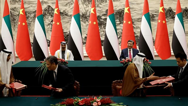 Chinese President Xi Jinping (back, right) and United Arab Emirates President Sheikh Mohammed bin Zayed Al Nahyan (back, left) attend a signing ceremony at the Great Hall of the People in Beijing on May 30, 2024.
