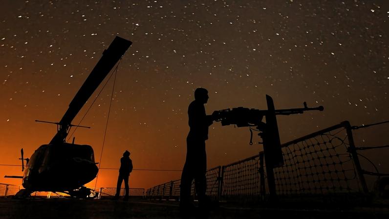 Iranian navy conducts the "Velayat-90" naval wargames in the Strait of Hormuz in southern Iran on January 1, 2012.